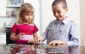 Child, Playing Puzzles At Home Stock Photo, Picture and Royalty ...